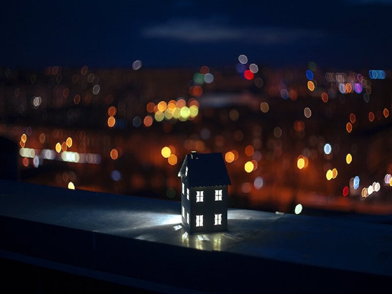 Miniature House on Ledge