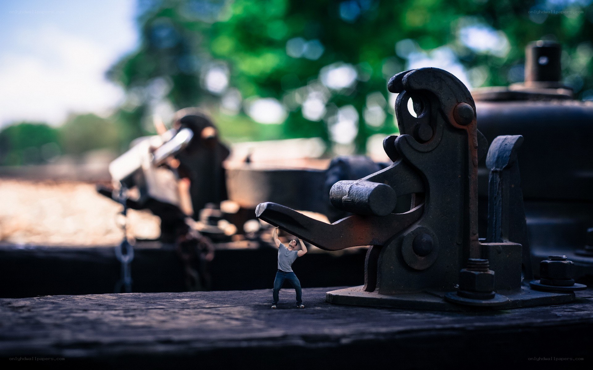 Miniature man lifting lever