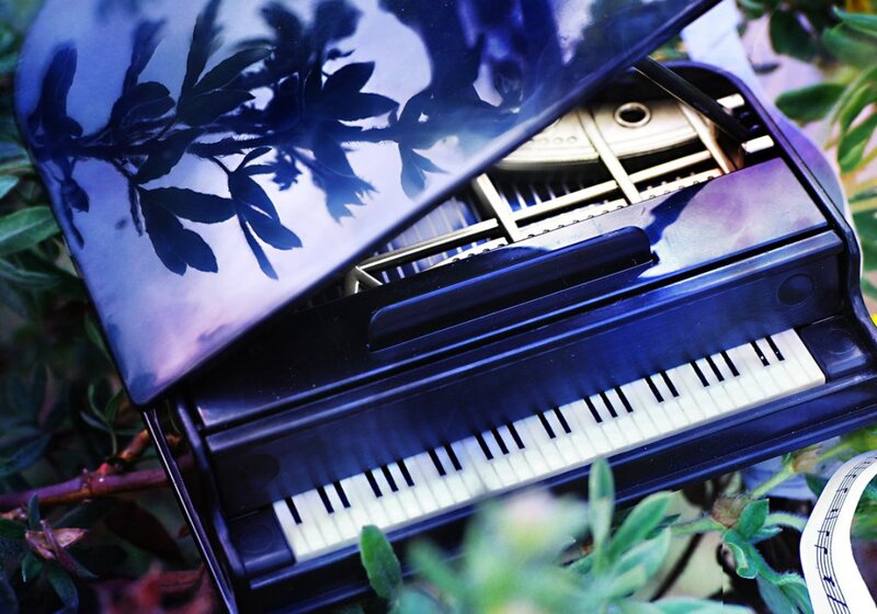 Miniature Piano in Garden