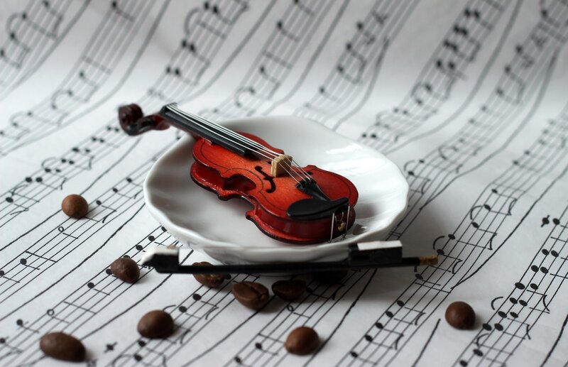Miniature Violin on Sheet Music