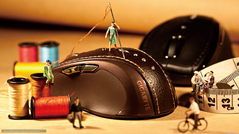 Miniature workers on computer mouse