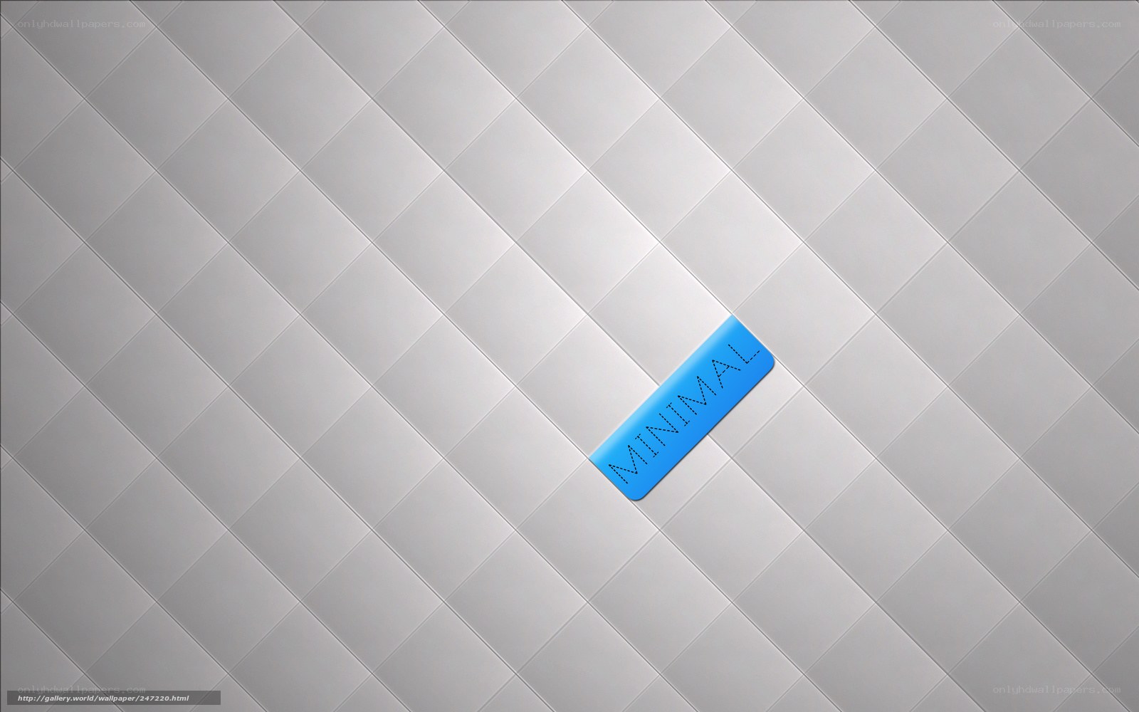 minimal blue label on tiled wall