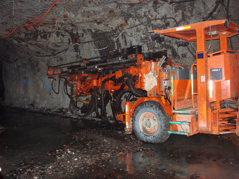 Mining machine in underground tunnel