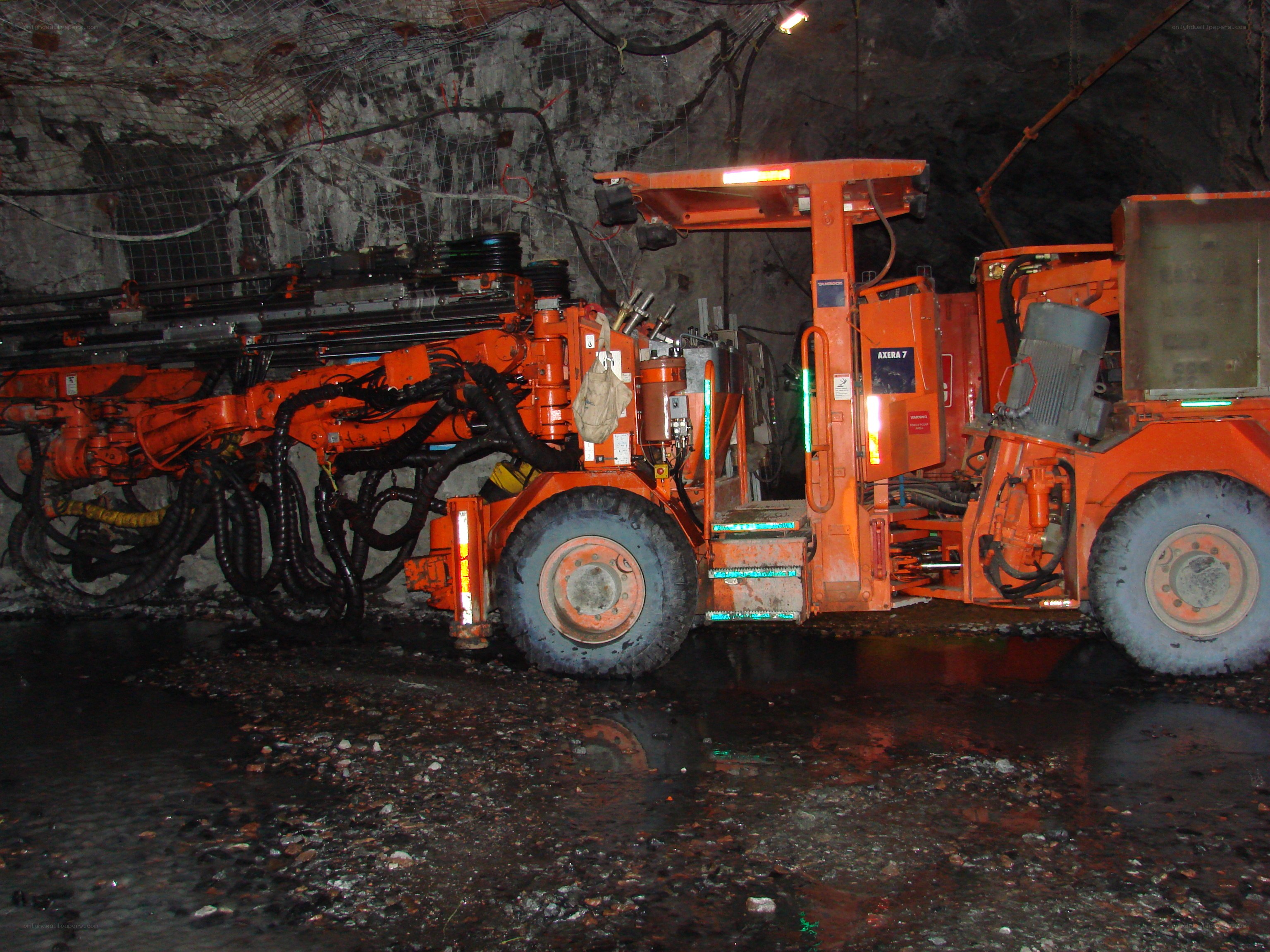 Mining vehicle in underground tunnel