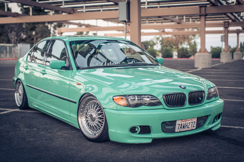 mint green bmw sedan