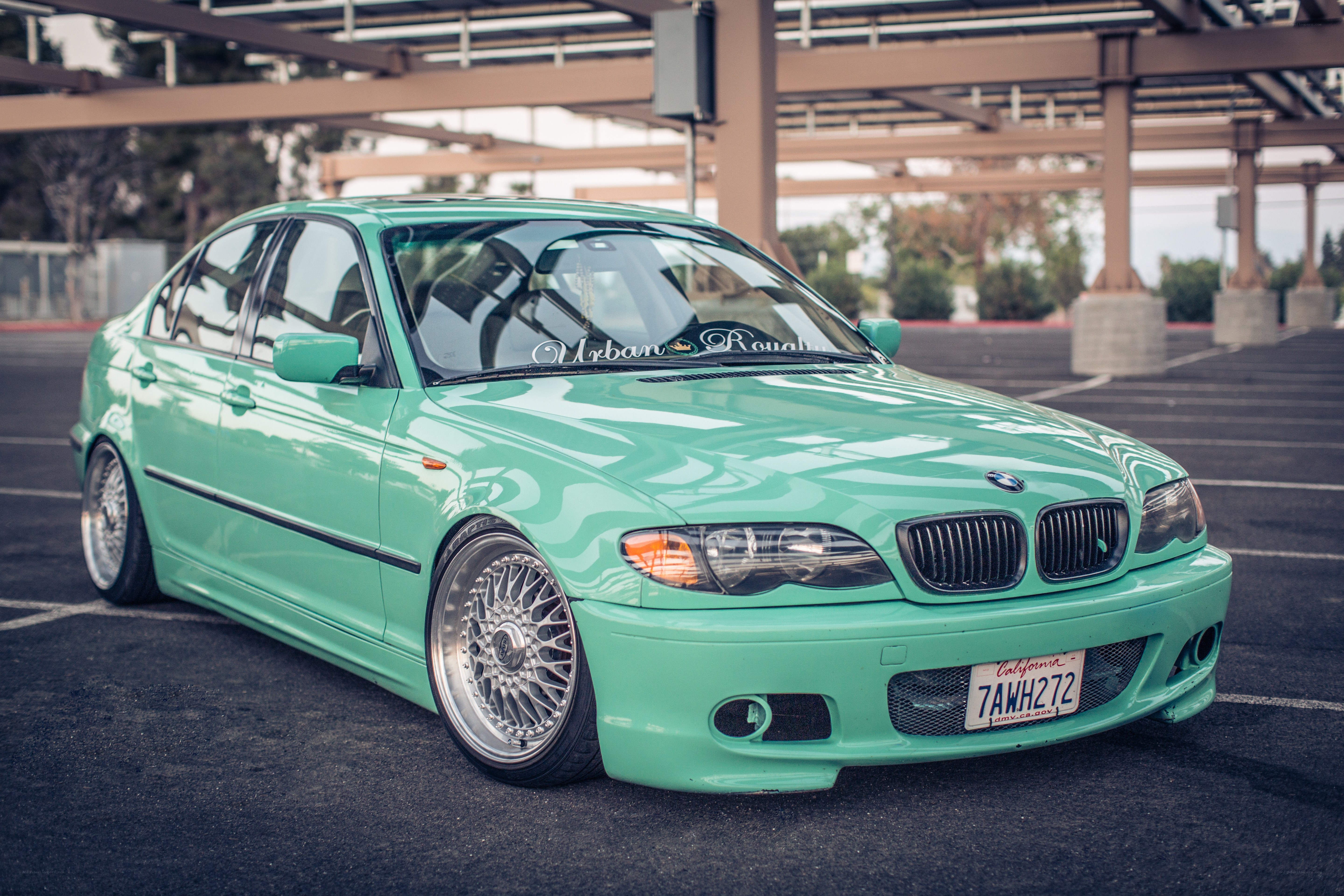 mint green bmw sedan