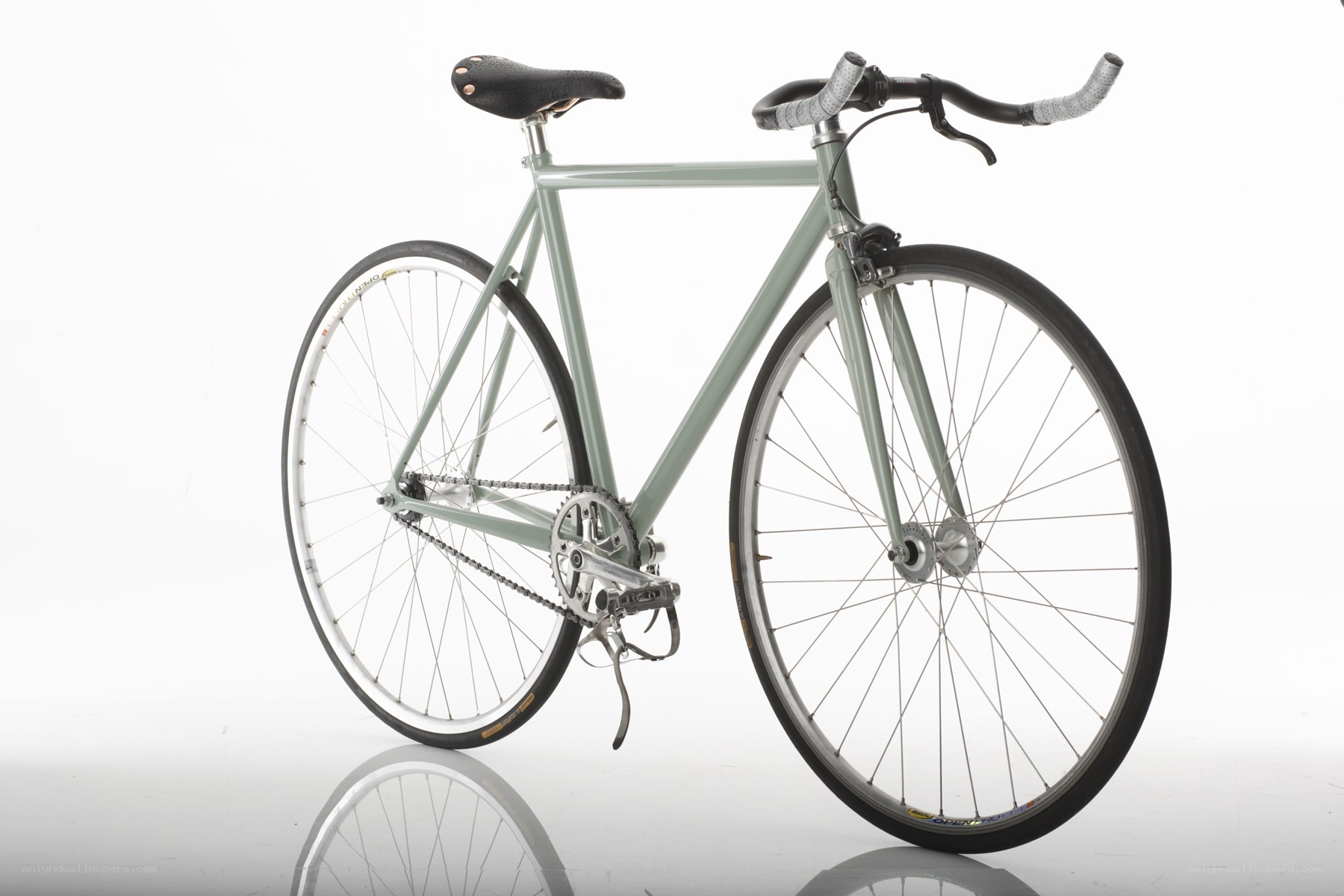 mint green fixed-gear bicycle