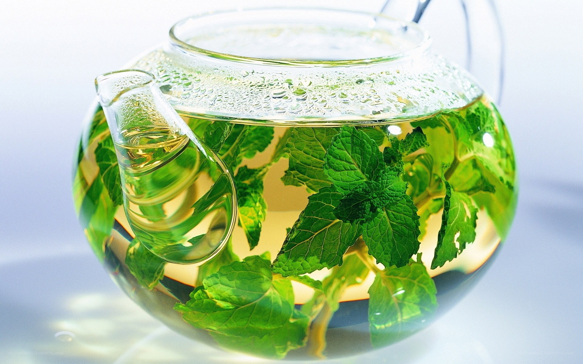 mint tea in glass teapot