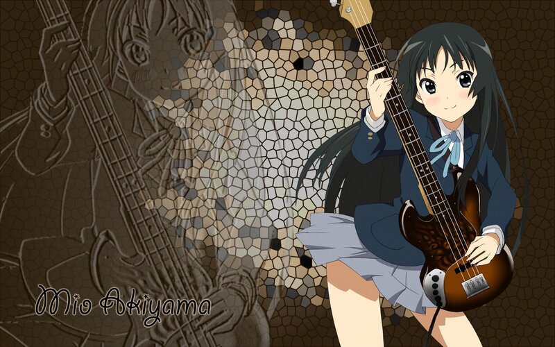 Mio Akiyama with bass guitar