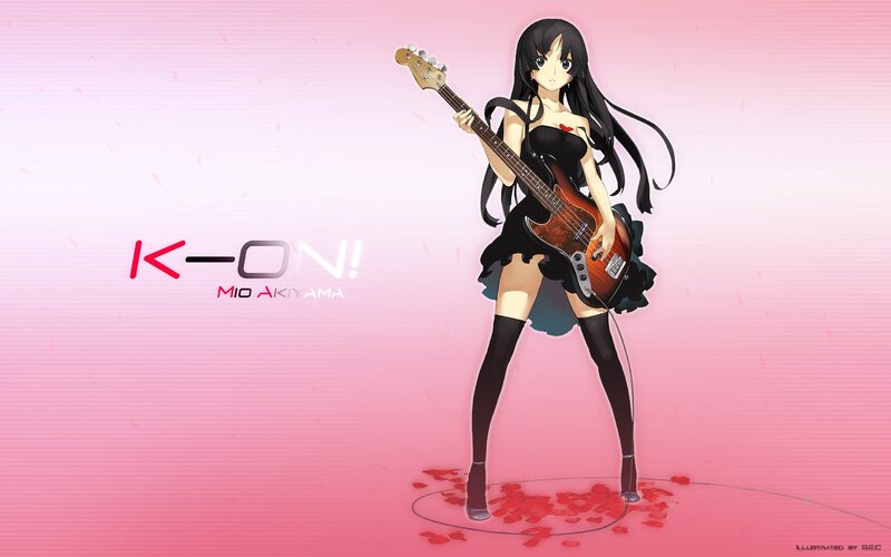 Mio Akiyama with bass guitar