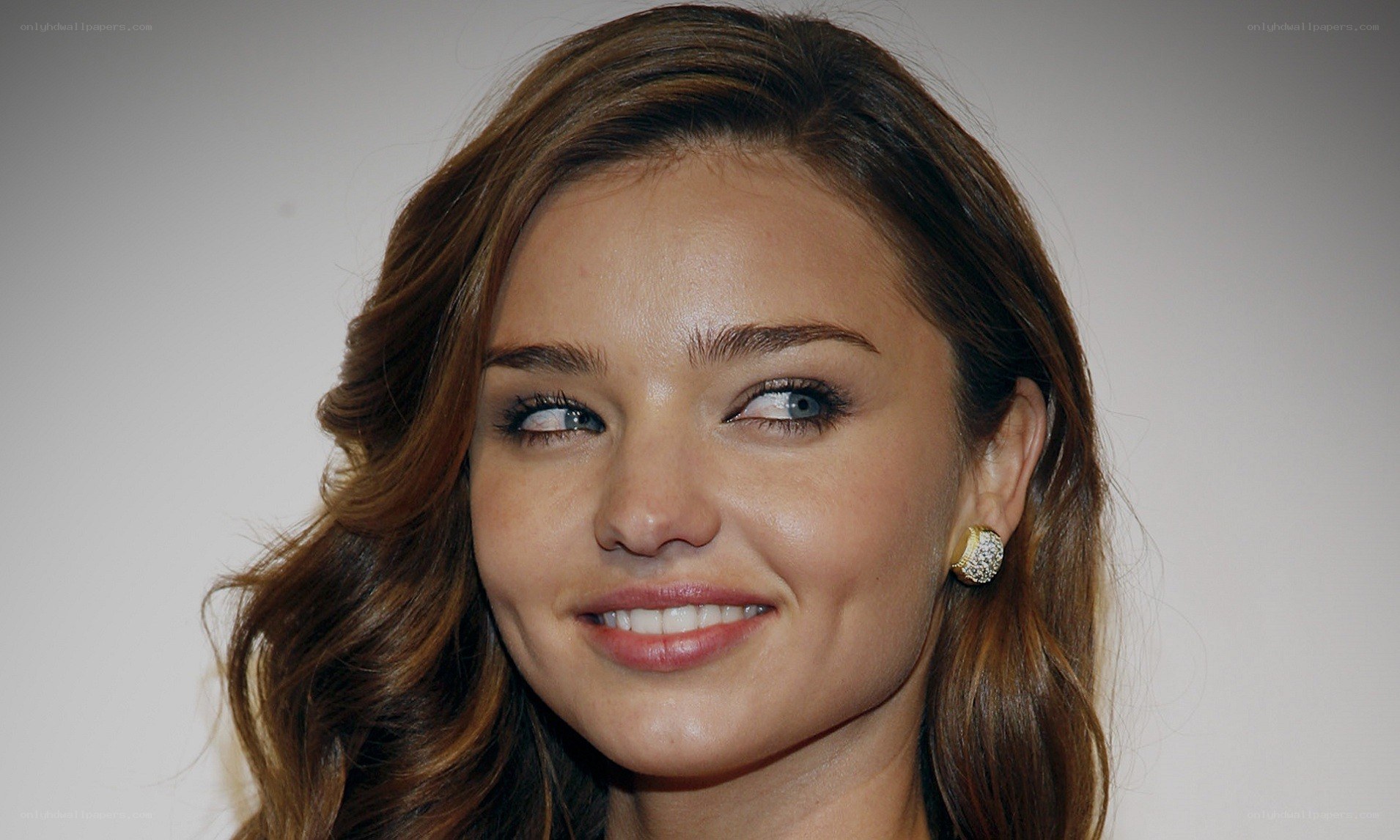 Miranda Kerr smiling at event