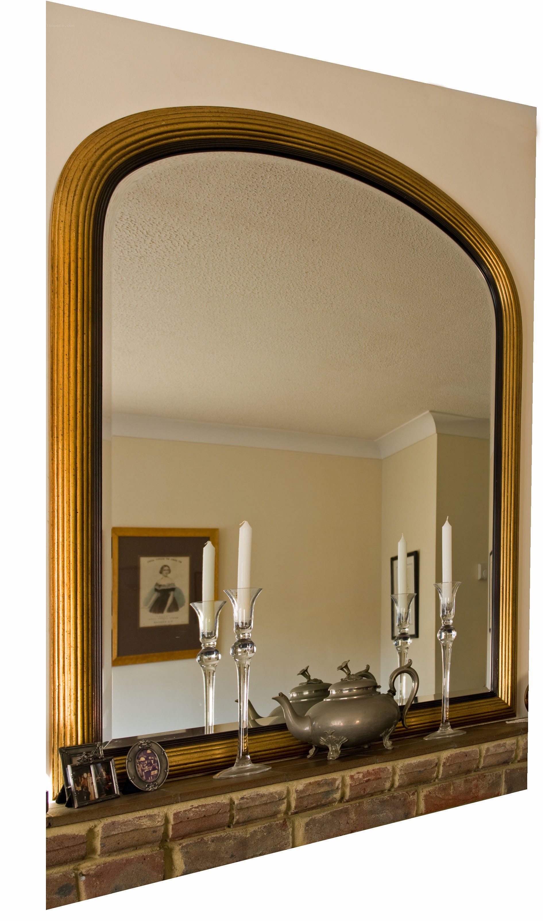 mirror above fireplace mantle