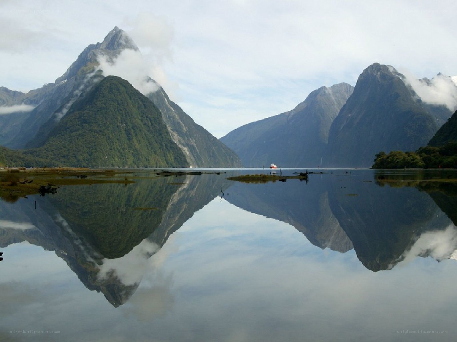 Mirror-like lake with mountain reflections