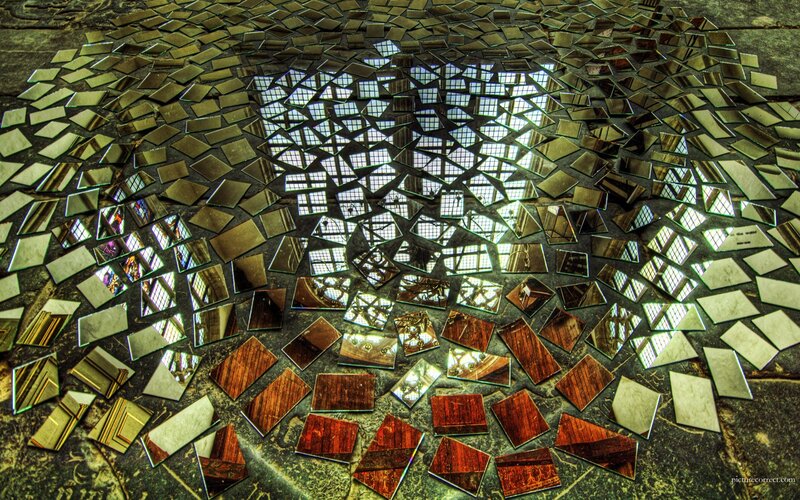 Mirror mosaic floor with light patterns