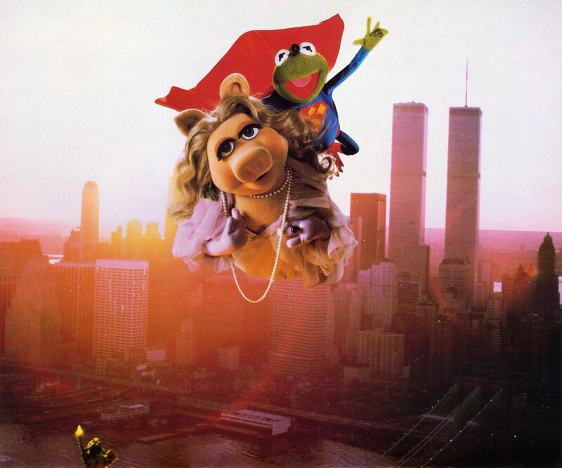 Miss Piggy and Kermit Flying