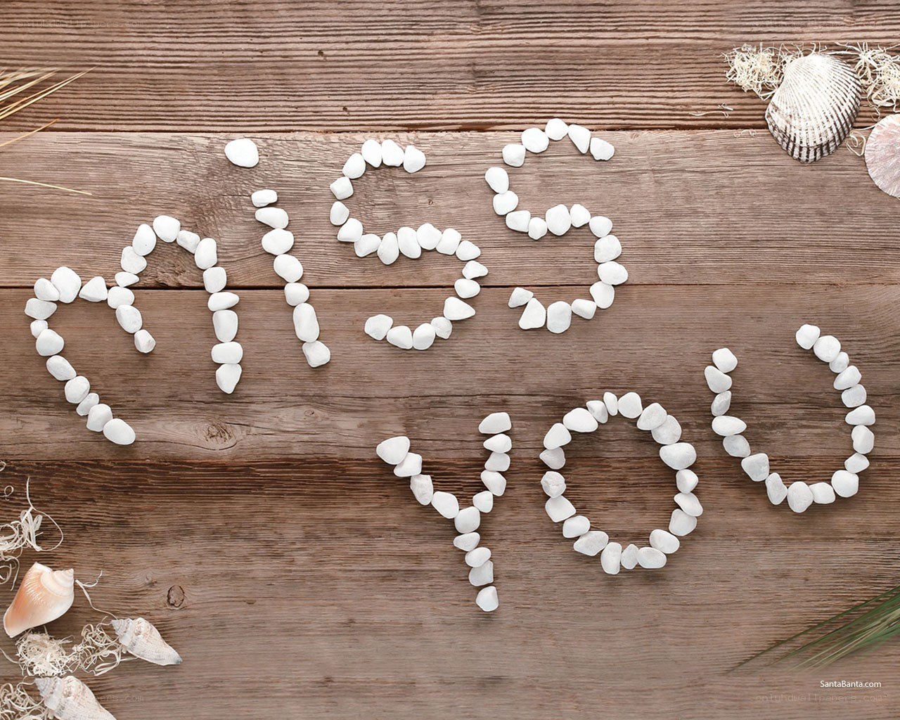 Miss You message with pebbles