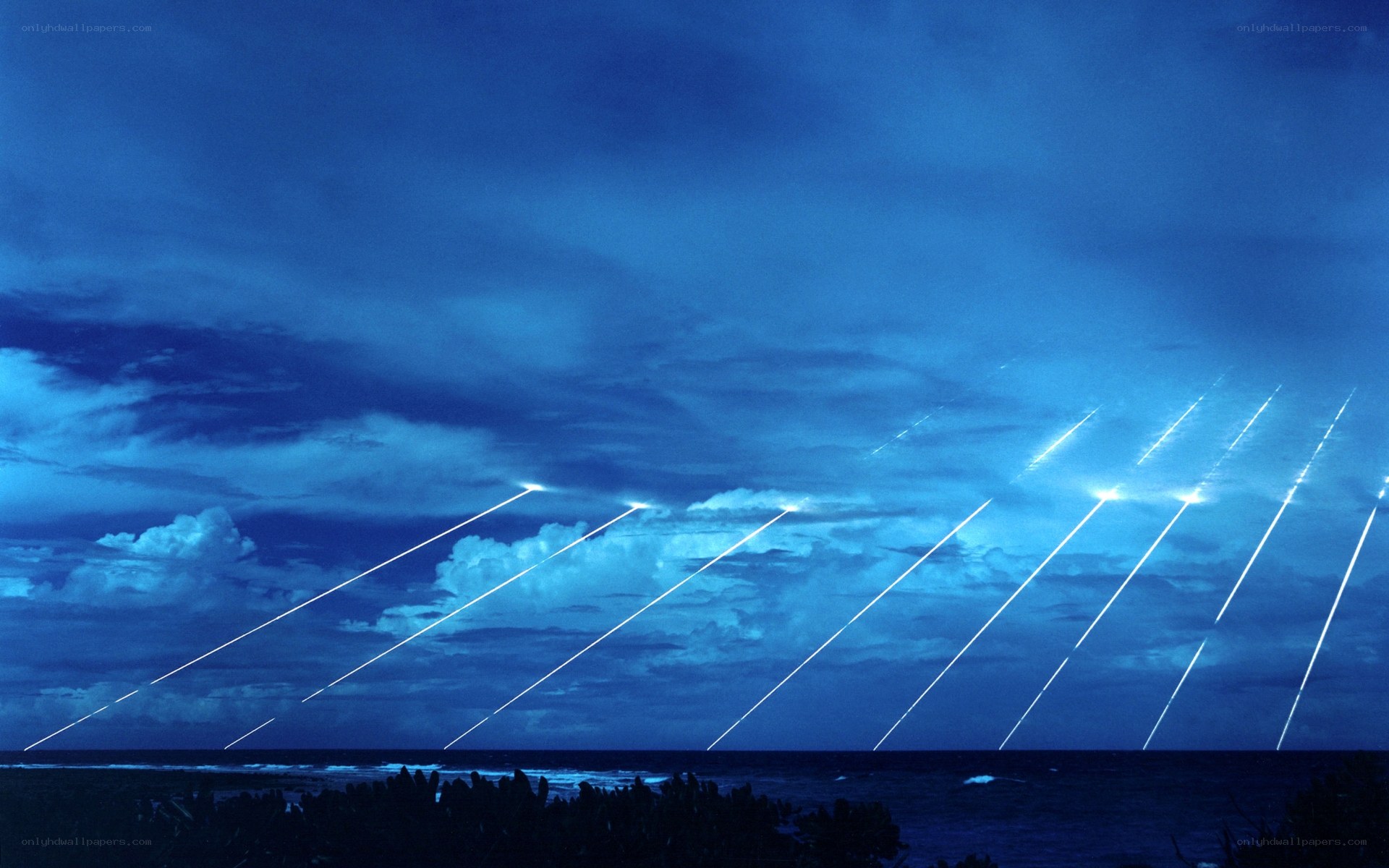 Missile launches over ocean