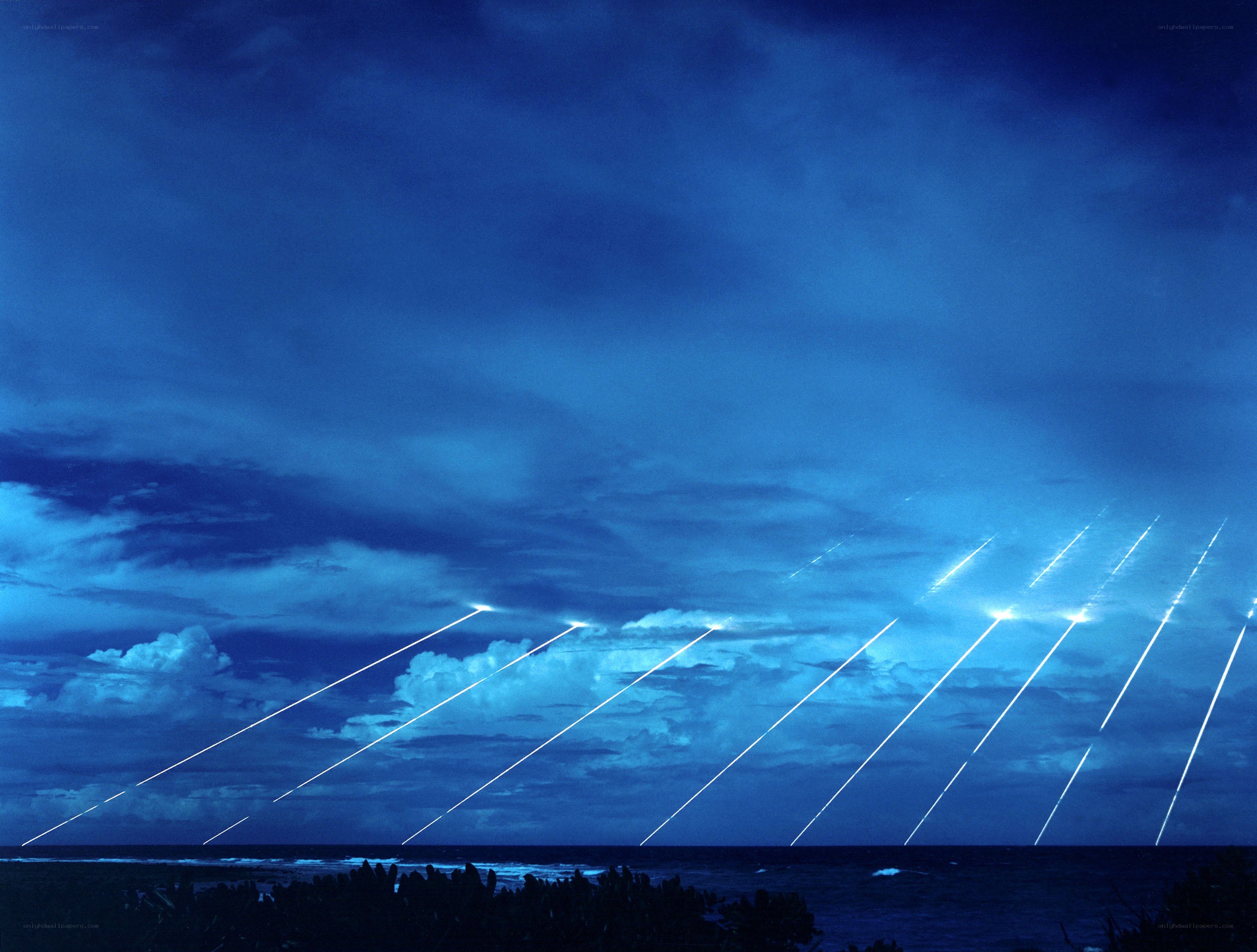 Missiles launching at night