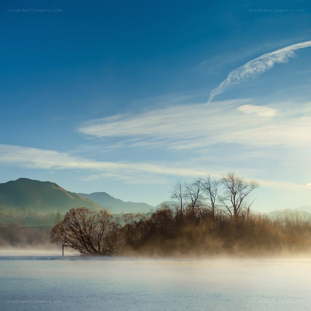 Mist over a lake at dawn