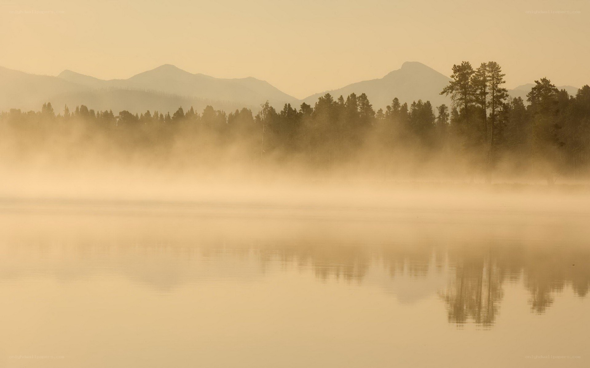 Mist over a mountain lake