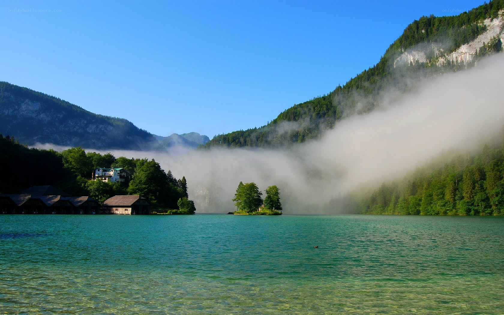 Mist over a mountain lake