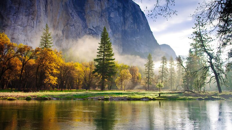 Mist over river in valley