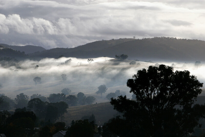 Mist over rolling hills