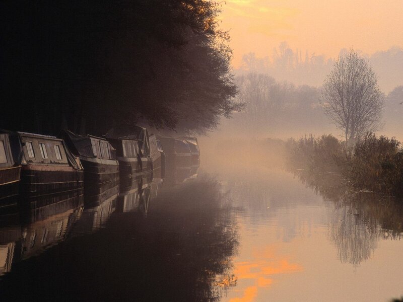 Misty canal at sunrise