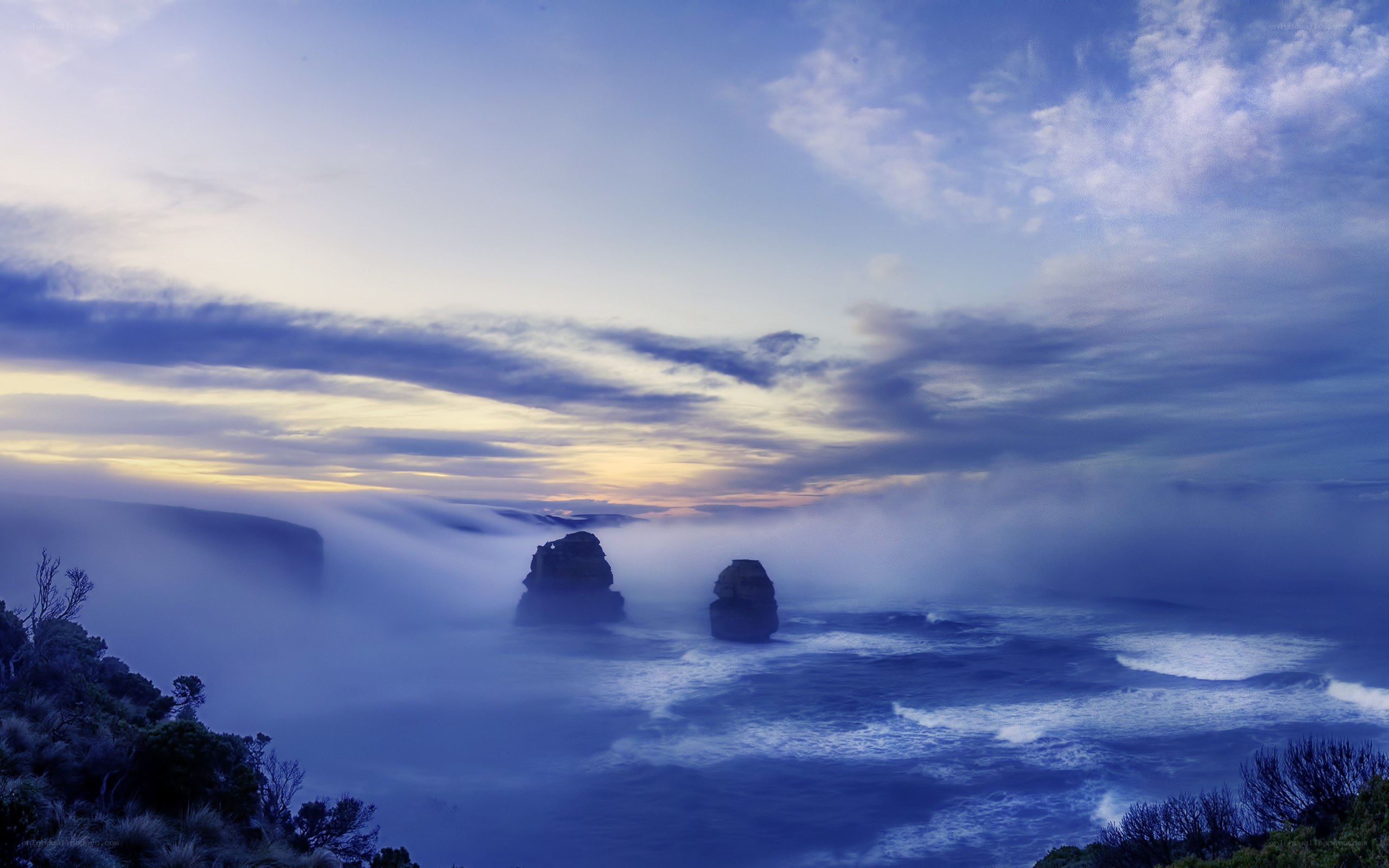 Misty coastal cliffs at dawn