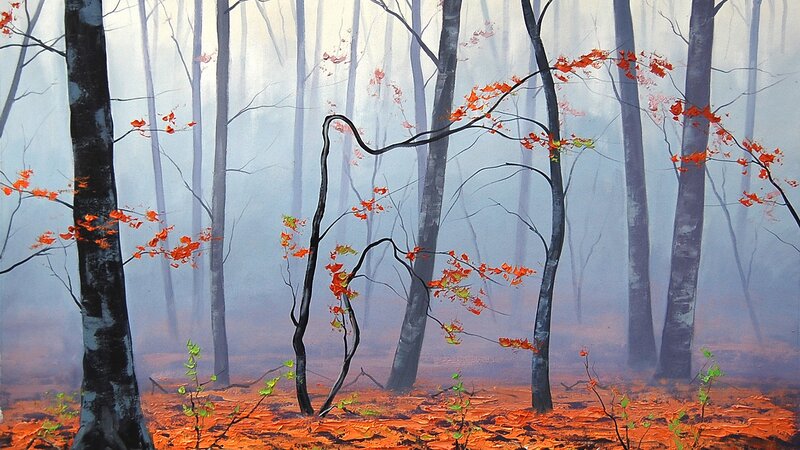 Misty forest with autumn leaves