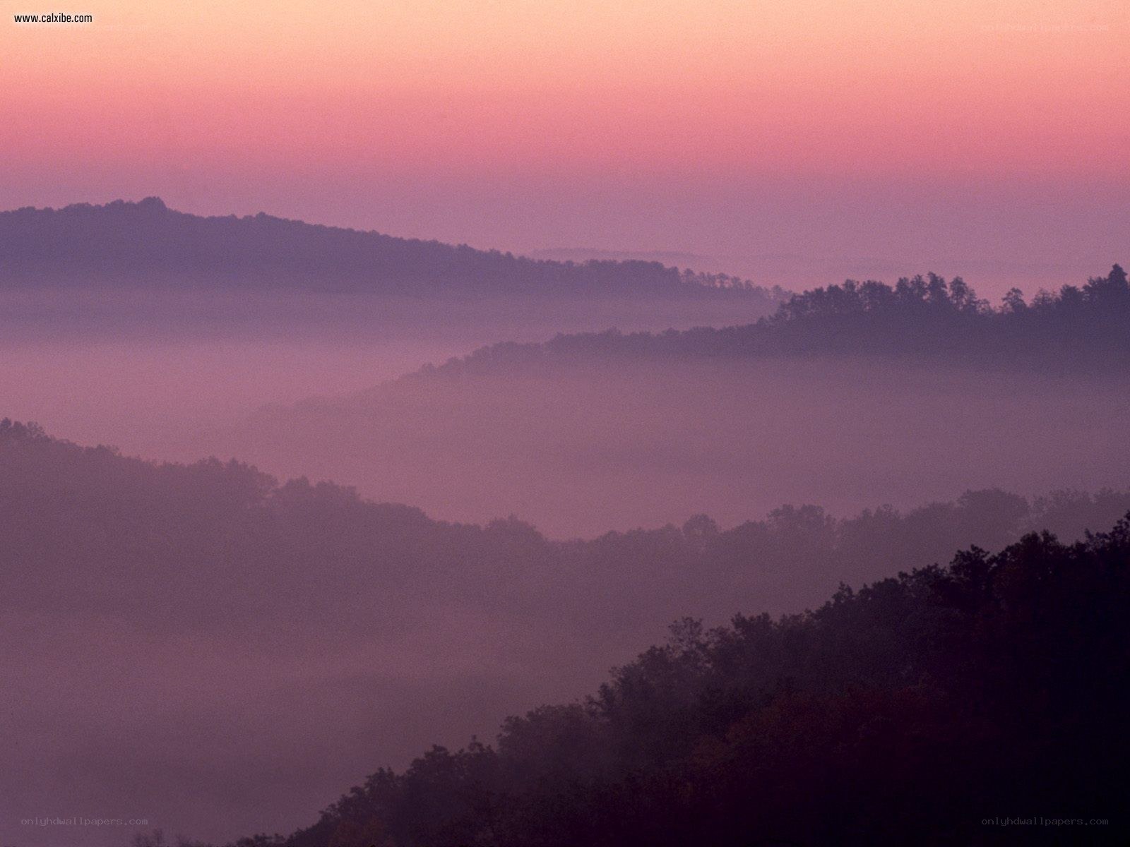 Misty hills at dawn