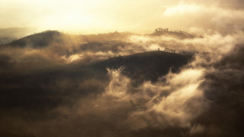 Misty hills at sunrise