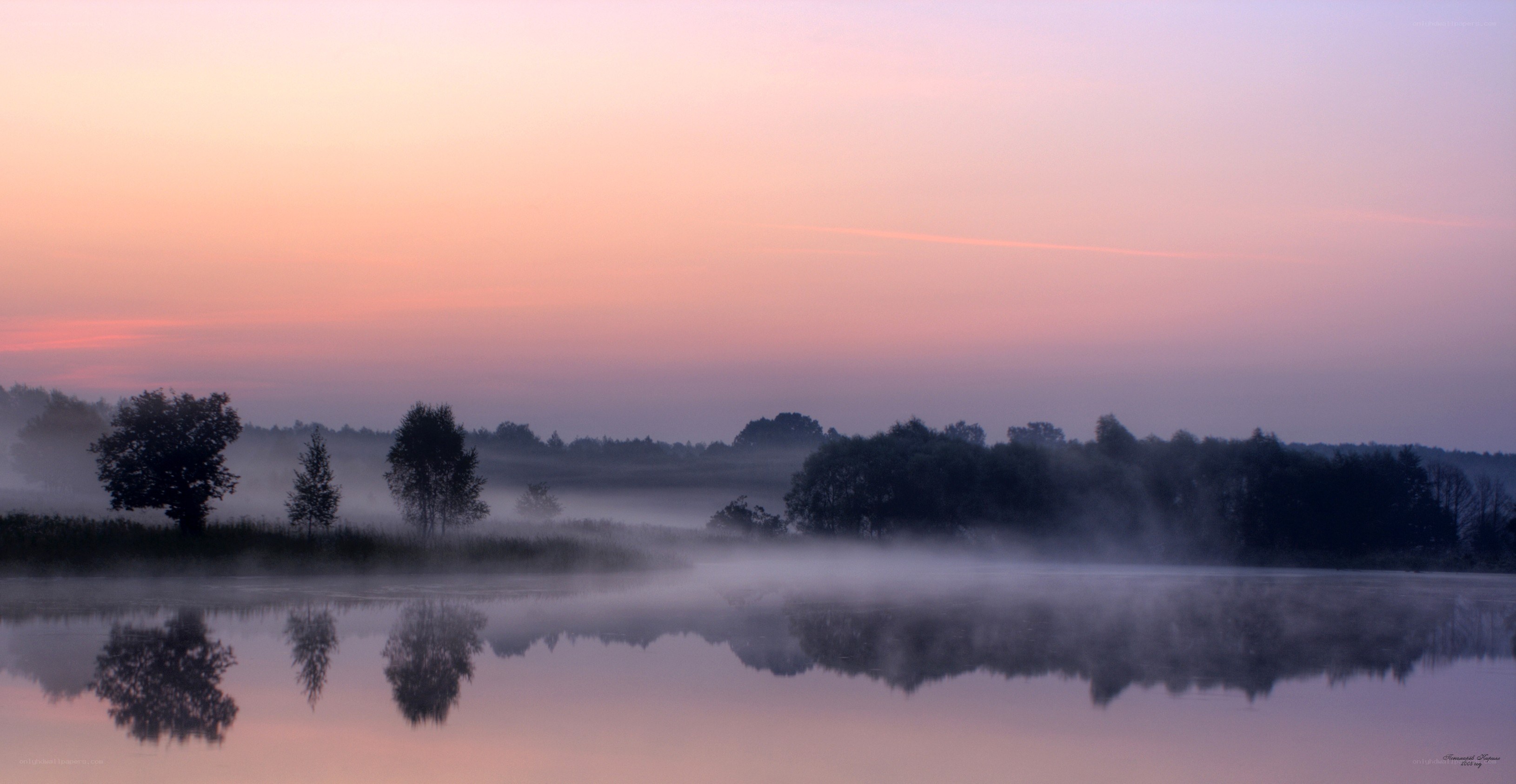 Misty lake at dawn
