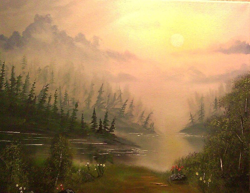Misty lake at sunrise