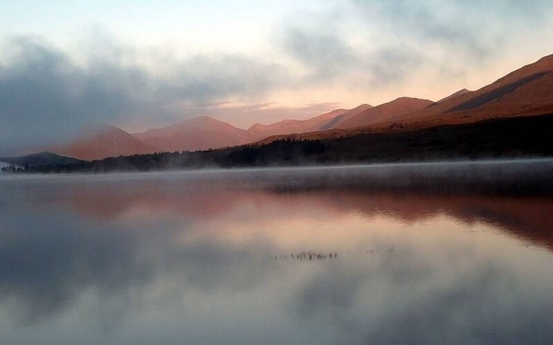misty lake at sunrise