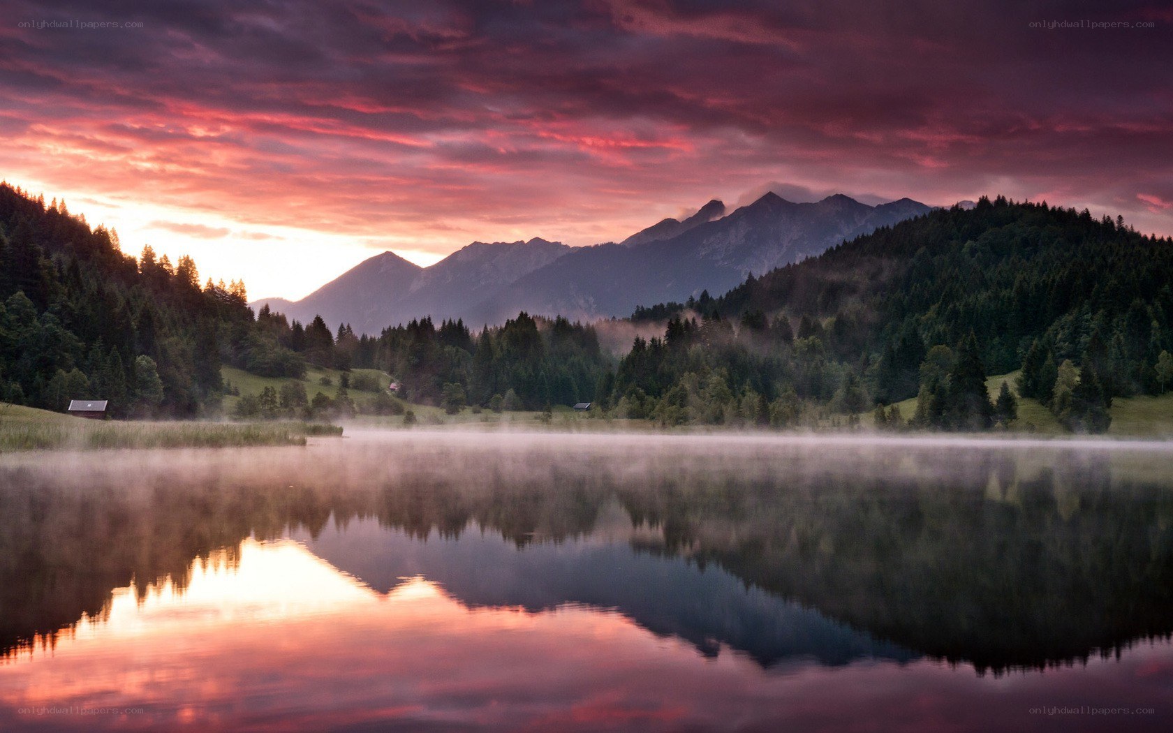 Misty lake at sunset