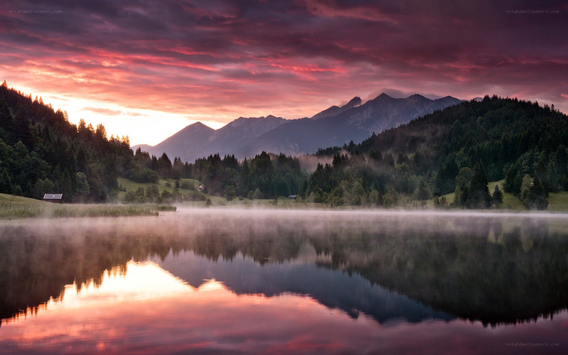 Misty lake at sunset