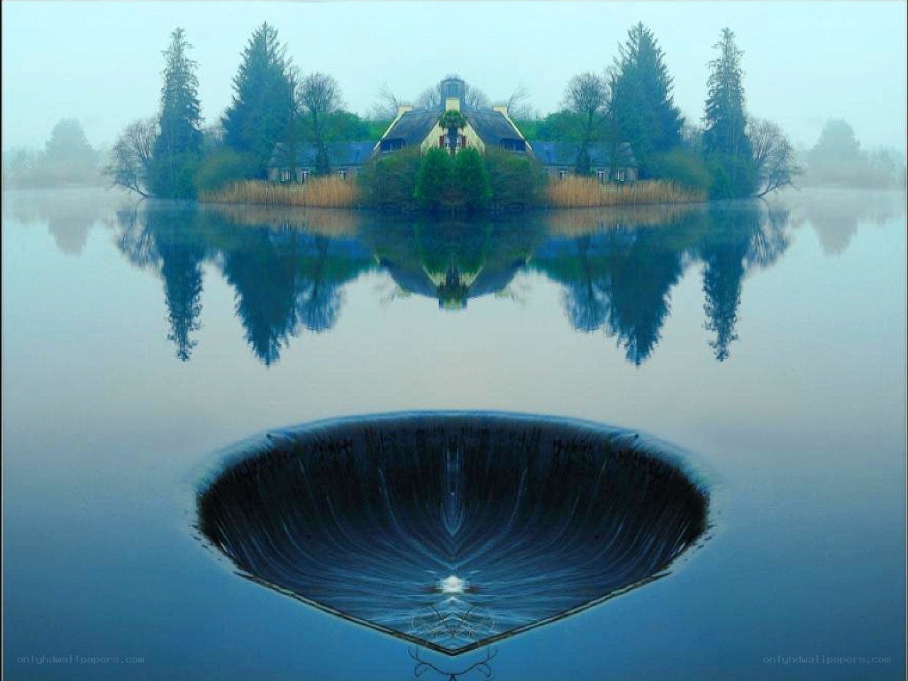 Misty lake with house reflection