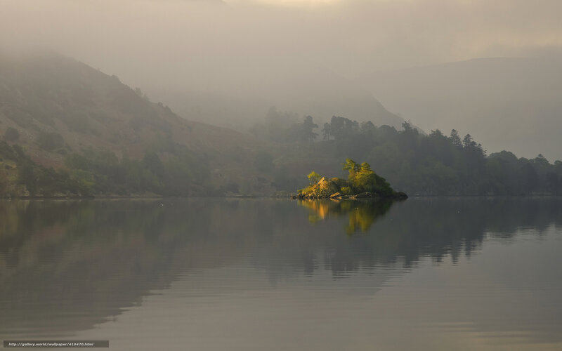 Misty lake with island