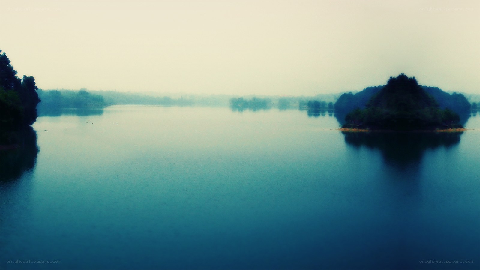Misty lake with islands