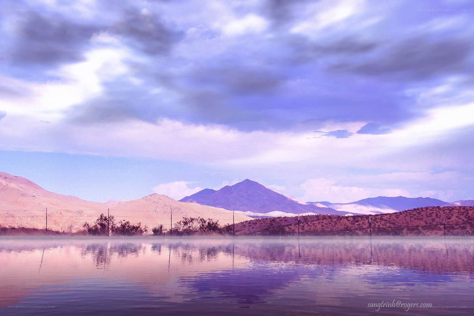 Misty lake with mountains