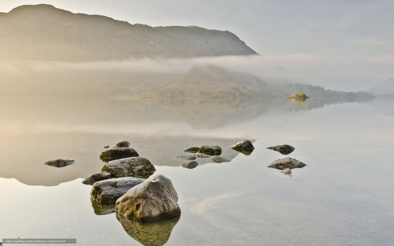 Misty lake with rocks