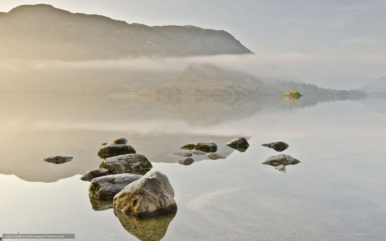 Misty lake with rocks