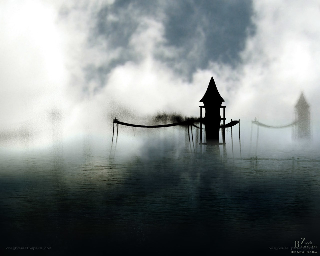 Misty lake with silhouetted towers