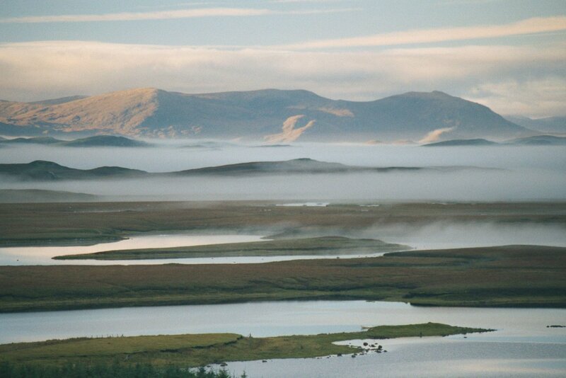 Misty landscape with mountains