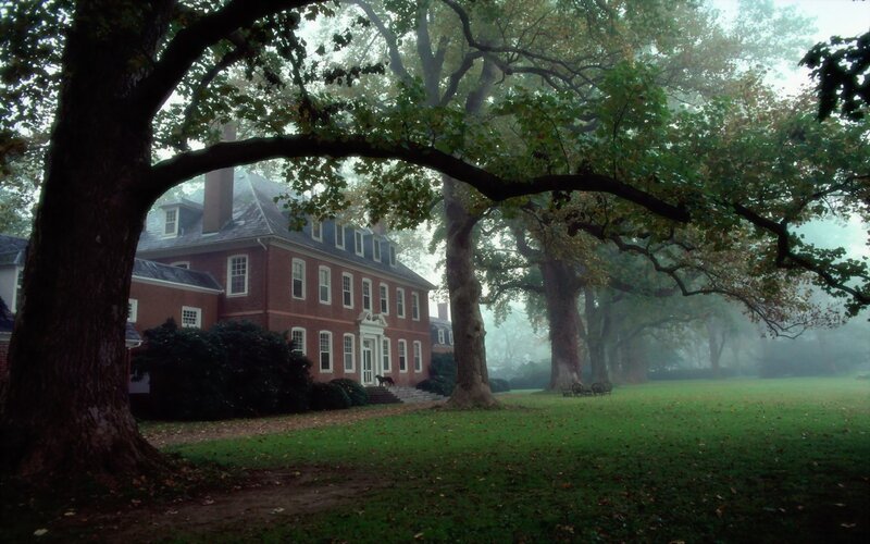 Misty morning at a brick mansion