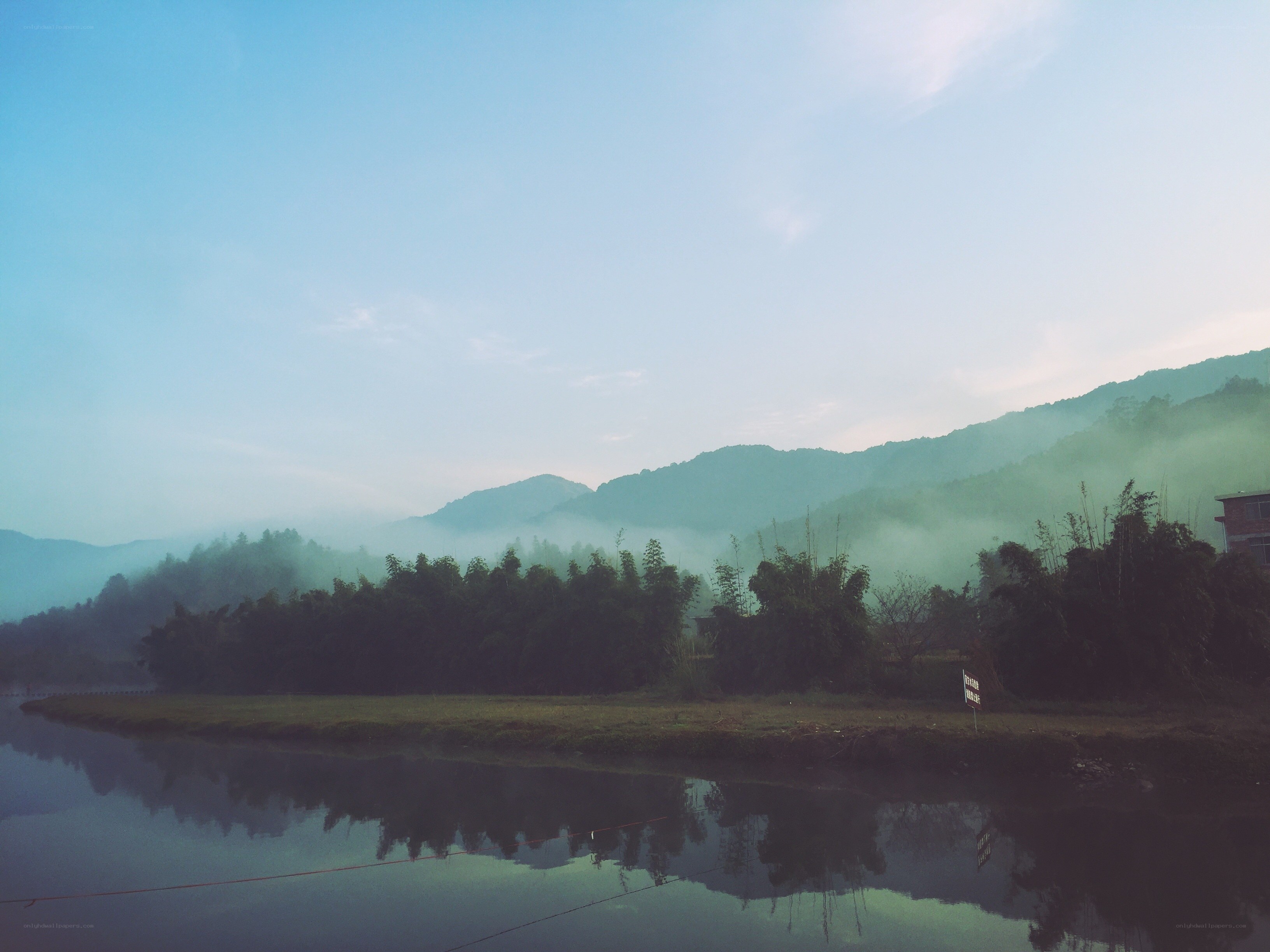 Misty morning over a river