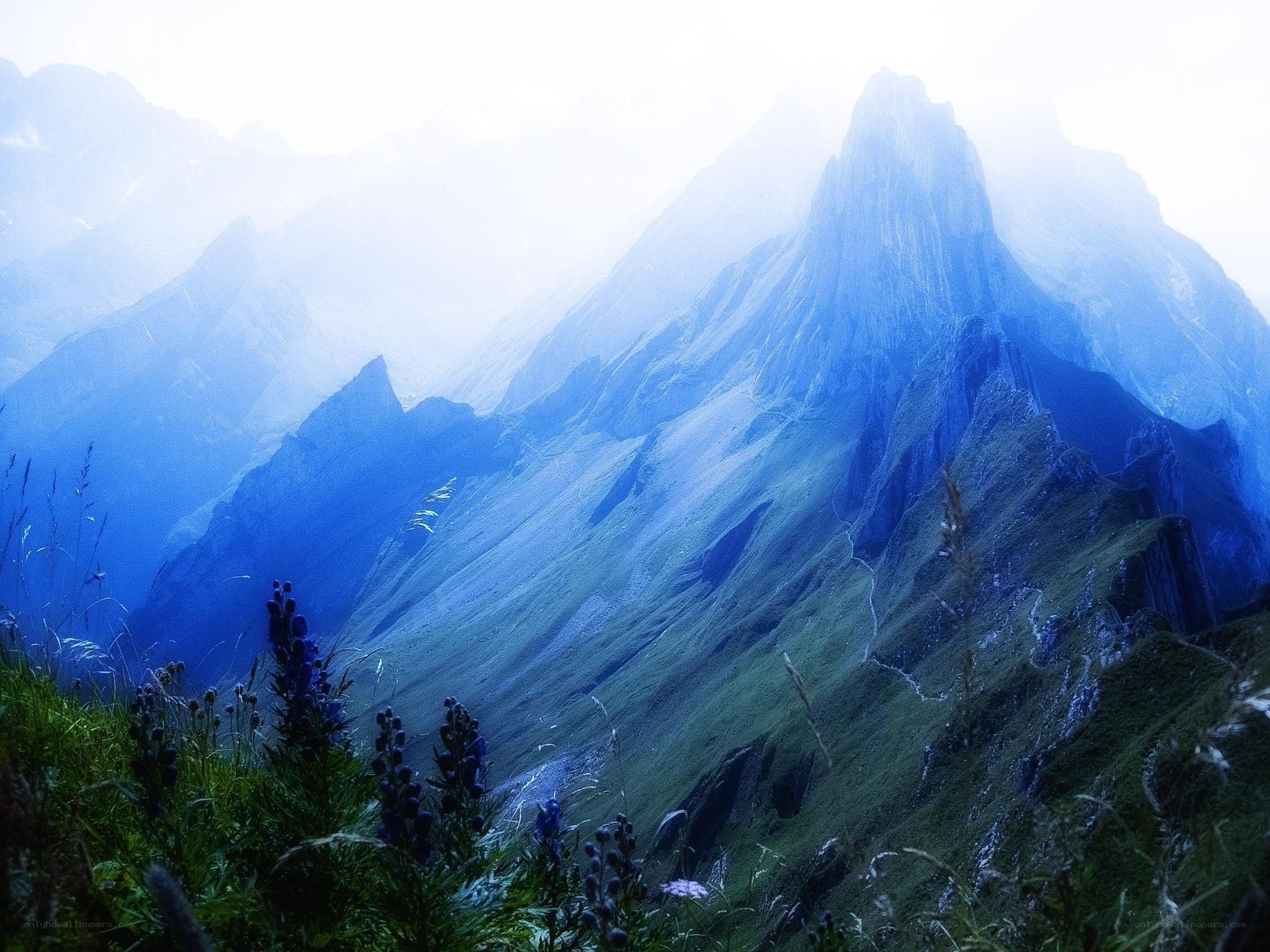 Misty mountain peaks at dawn