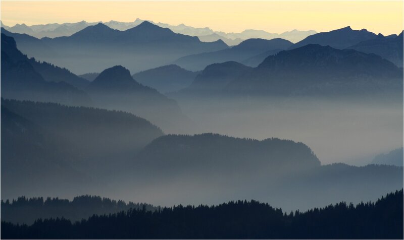 Misty mountain ranges at dawn