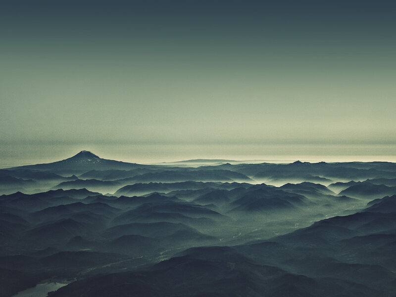 Misty mountain ranges at dawn
